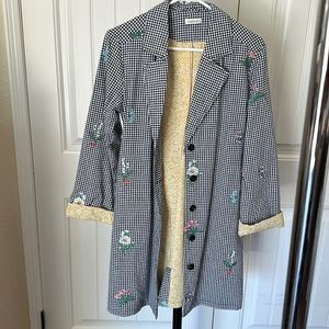 Brand is Sundance.  New without tags.  Lightweight coat. Navy check with flowers